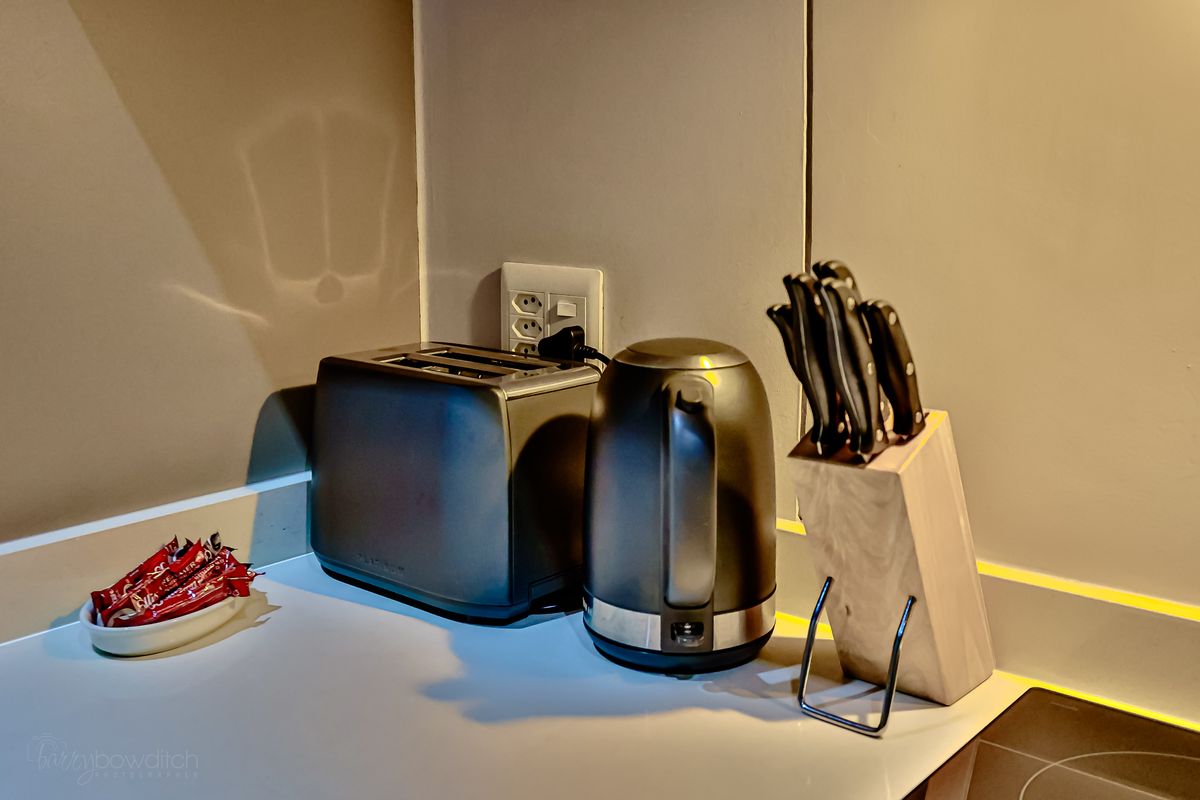 Kitchen counter with kettle, toaster and knife block